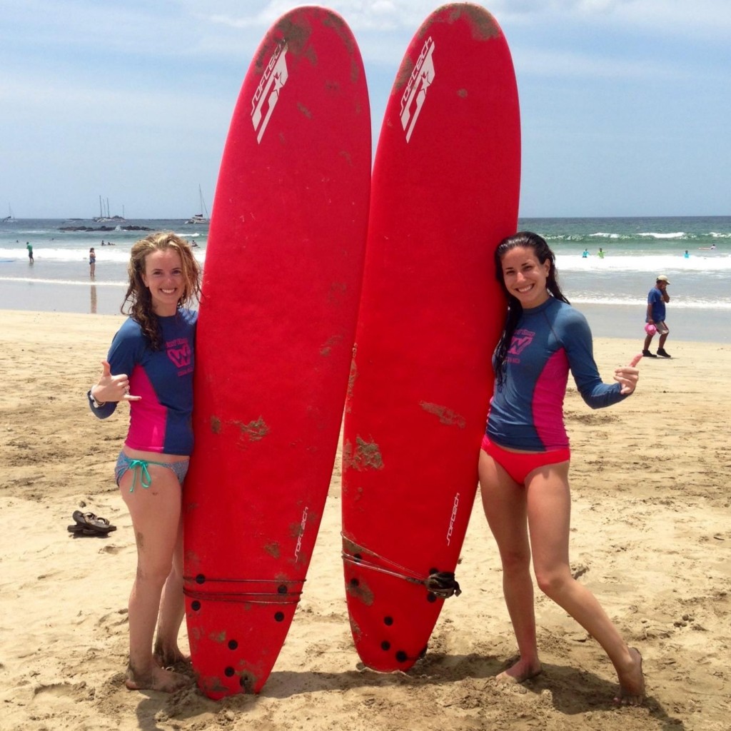 Everyone can learn to surf! Happy visitors after a surf session with Walter Surf Camp at Tamarindo Beach.